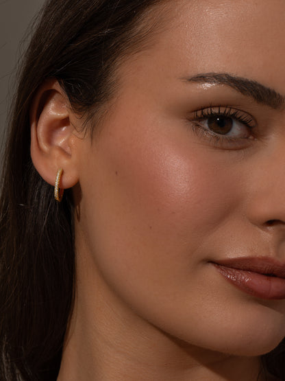 ["Tiny Huggies ", " Gold Clear  /  Medium ", " Model Image ", " Uncommon James"]