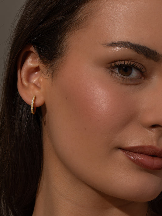 Tiny Huggies | Gold Clear | Model Image | Uncommon James