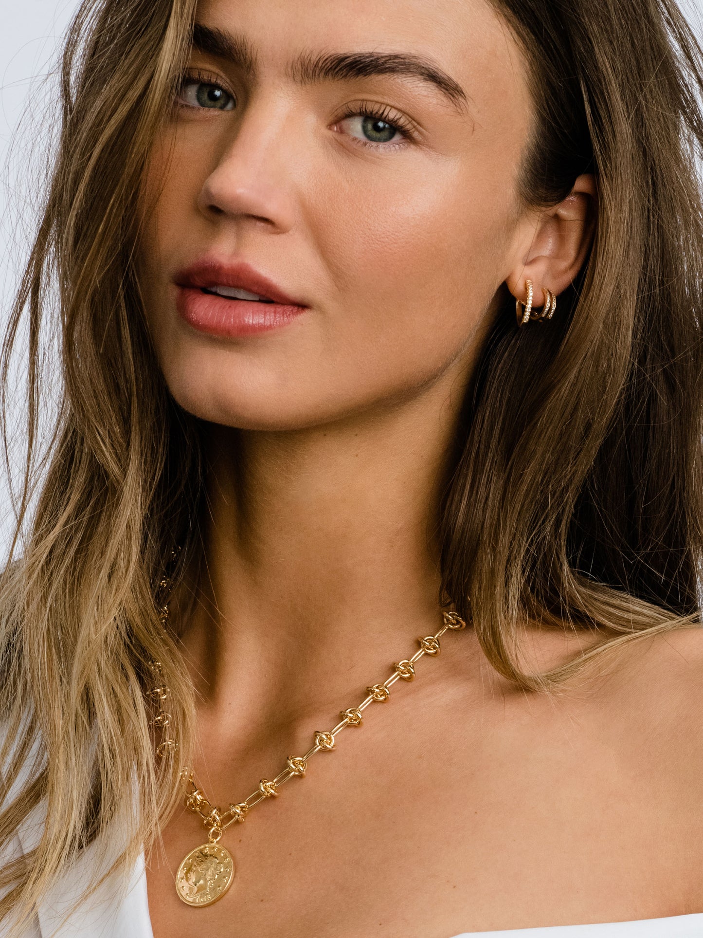 Tiny Huggies | Gold Clear  /  Medium | Model Image | Uncommon James