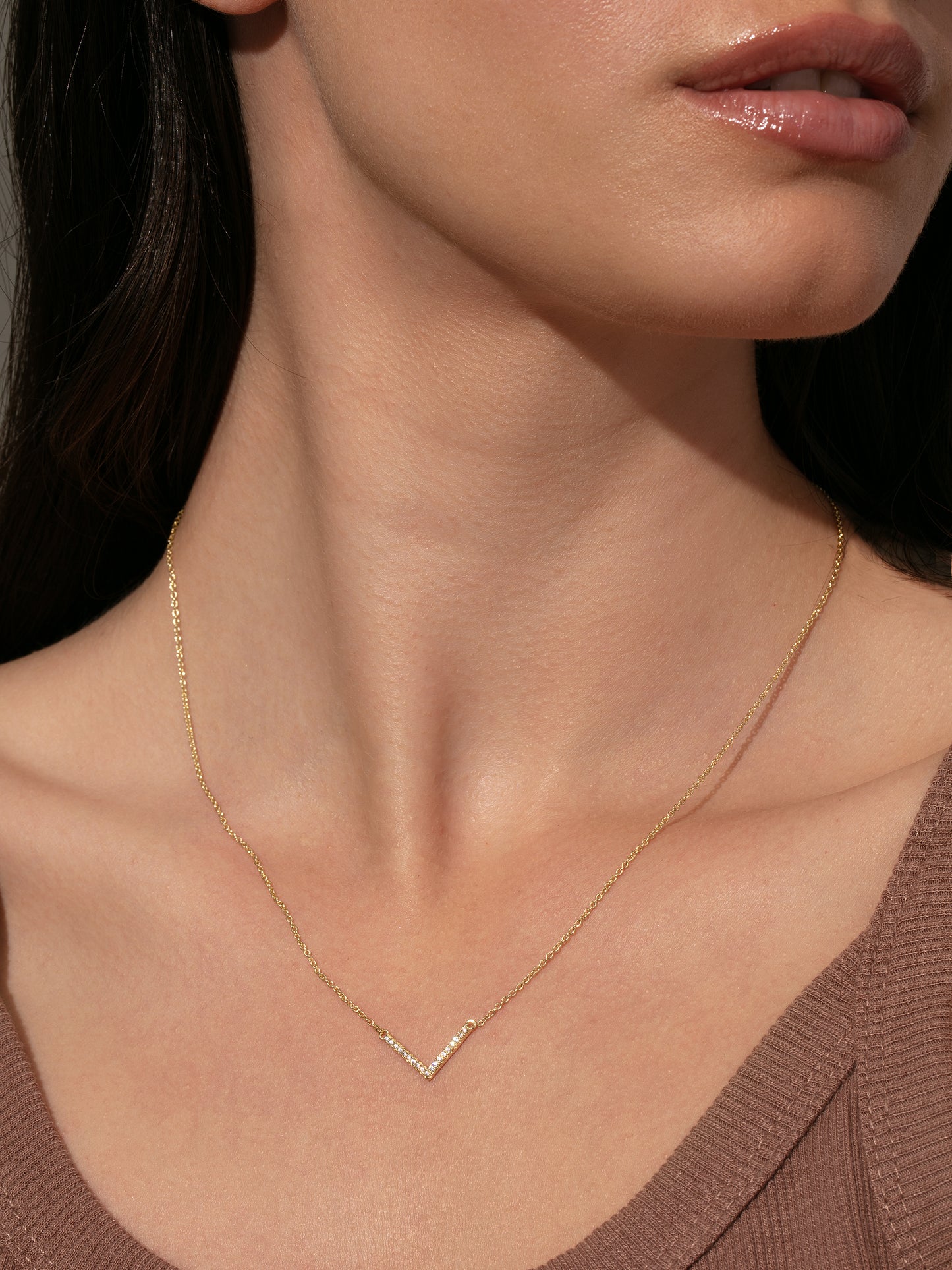 Baby V Necklace | Gold Clear | Model Image | Uncommon James