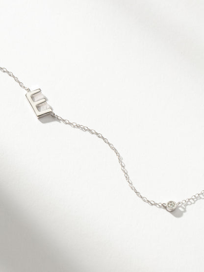["Personalized Touch Necklace ", " Sterling Silver E ", " Product Image ", " Uncommon James"]