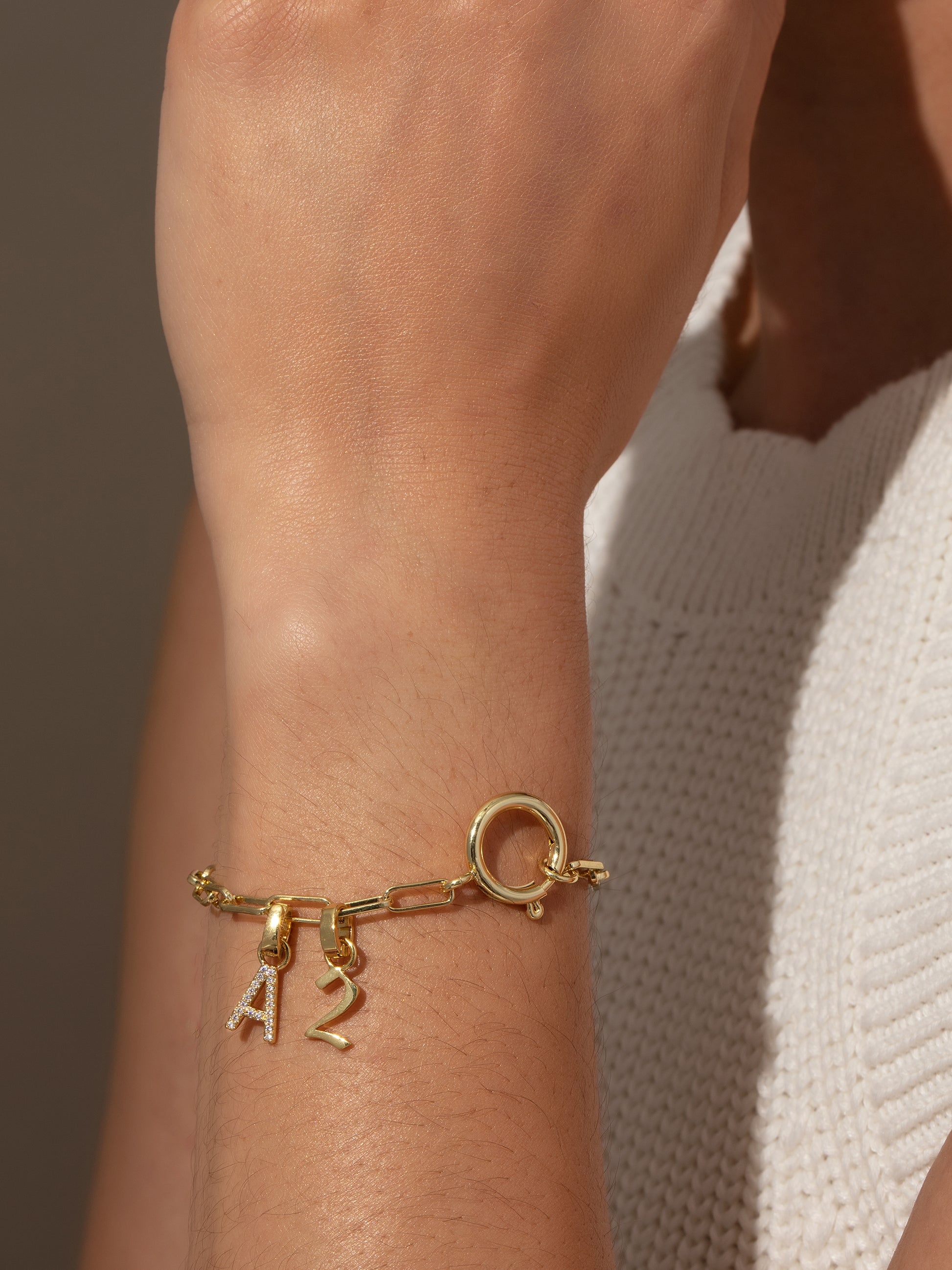 Pavé Letter Charm | Gold | Model Image | Uncommon James