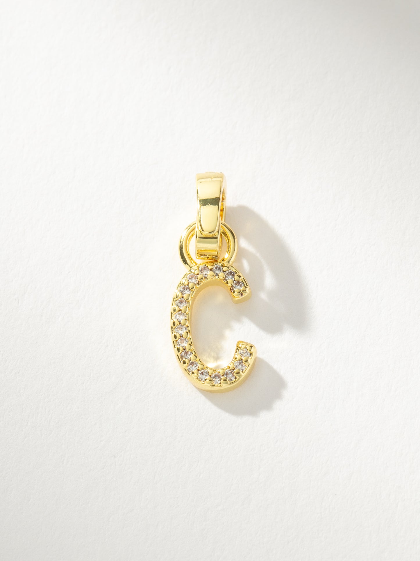 Letter Charm | Gold Clear C | Product Image | Uncommon James