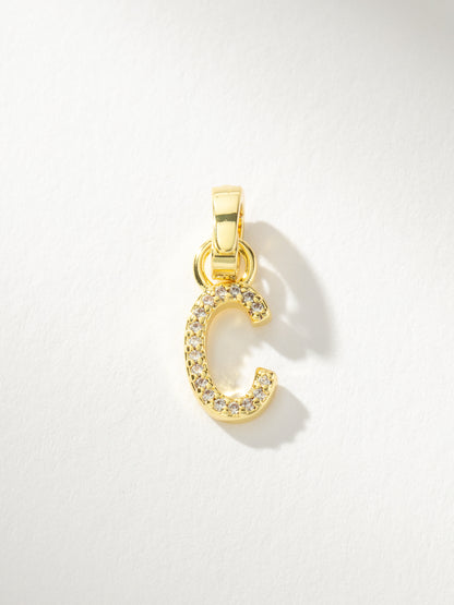 ["Letter Charm ", " Pavé Gold C ", " Product Image ", " Uncommon James"]