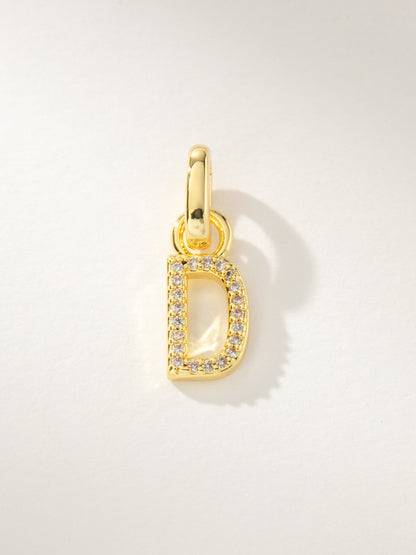["Pavé Letter Charm ", " Gold D ", " Product Image ", " Uncommon James"]