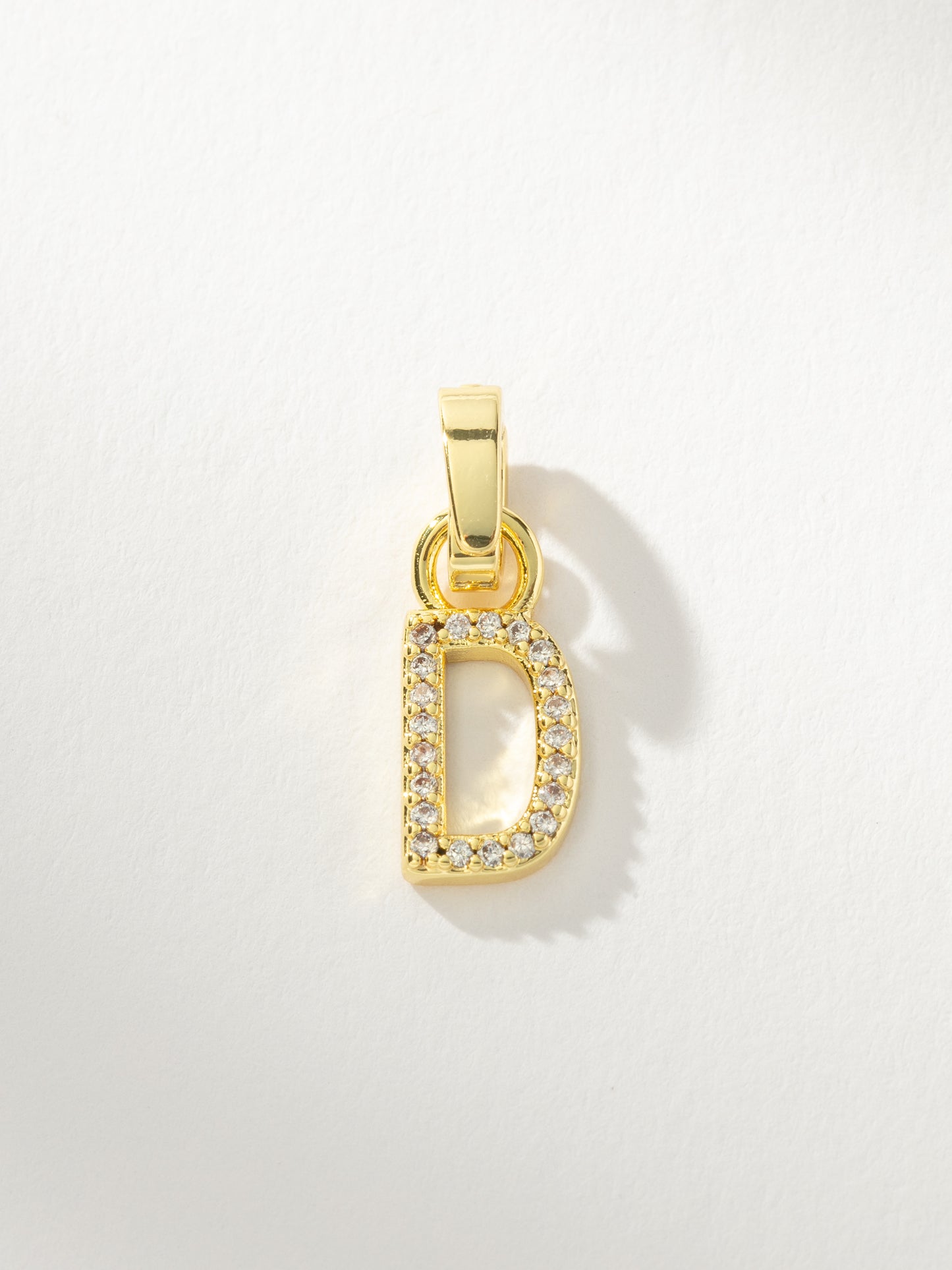 Letter Charm | Gold Clear D | Product Image | Uncommon James