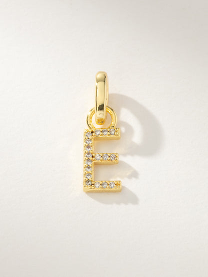 ["Pavé Letter Charm ", " Gold E ", " Product Image ", " Uncommon James"]