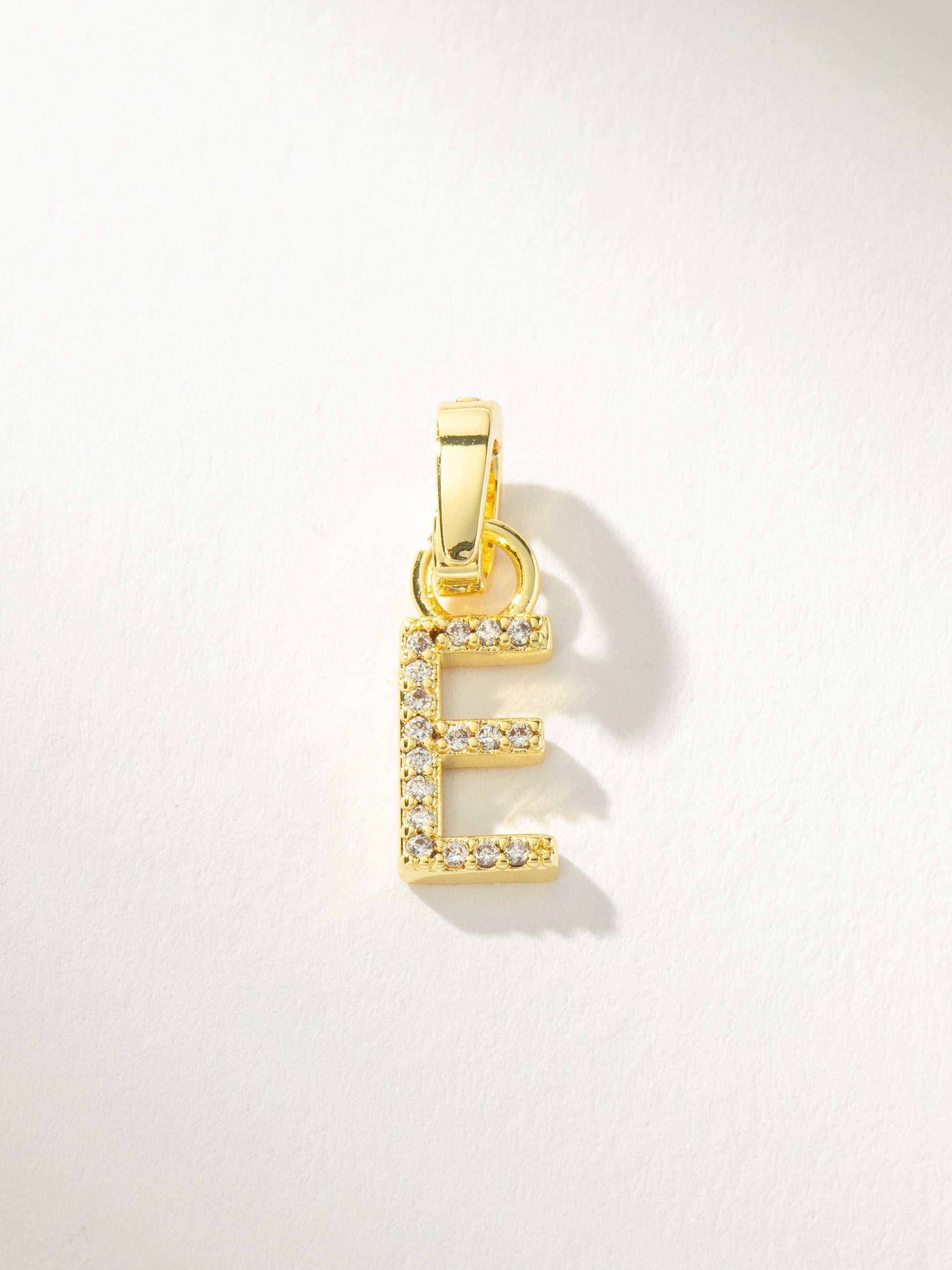 Letter Charm | Gold Clear E | Product Image | Uncommon James