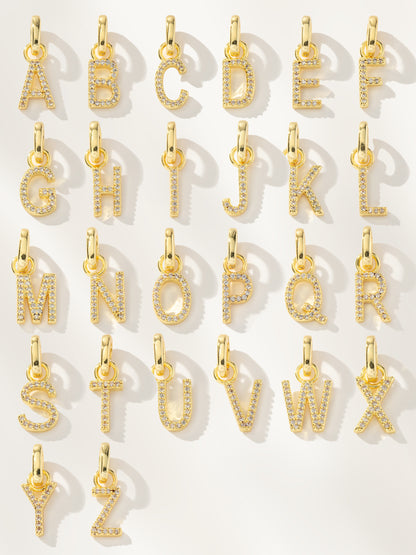 ["Pavé Letter Charm ", " Gold ", " Full Alphabet Image ", " Uncommon James"]