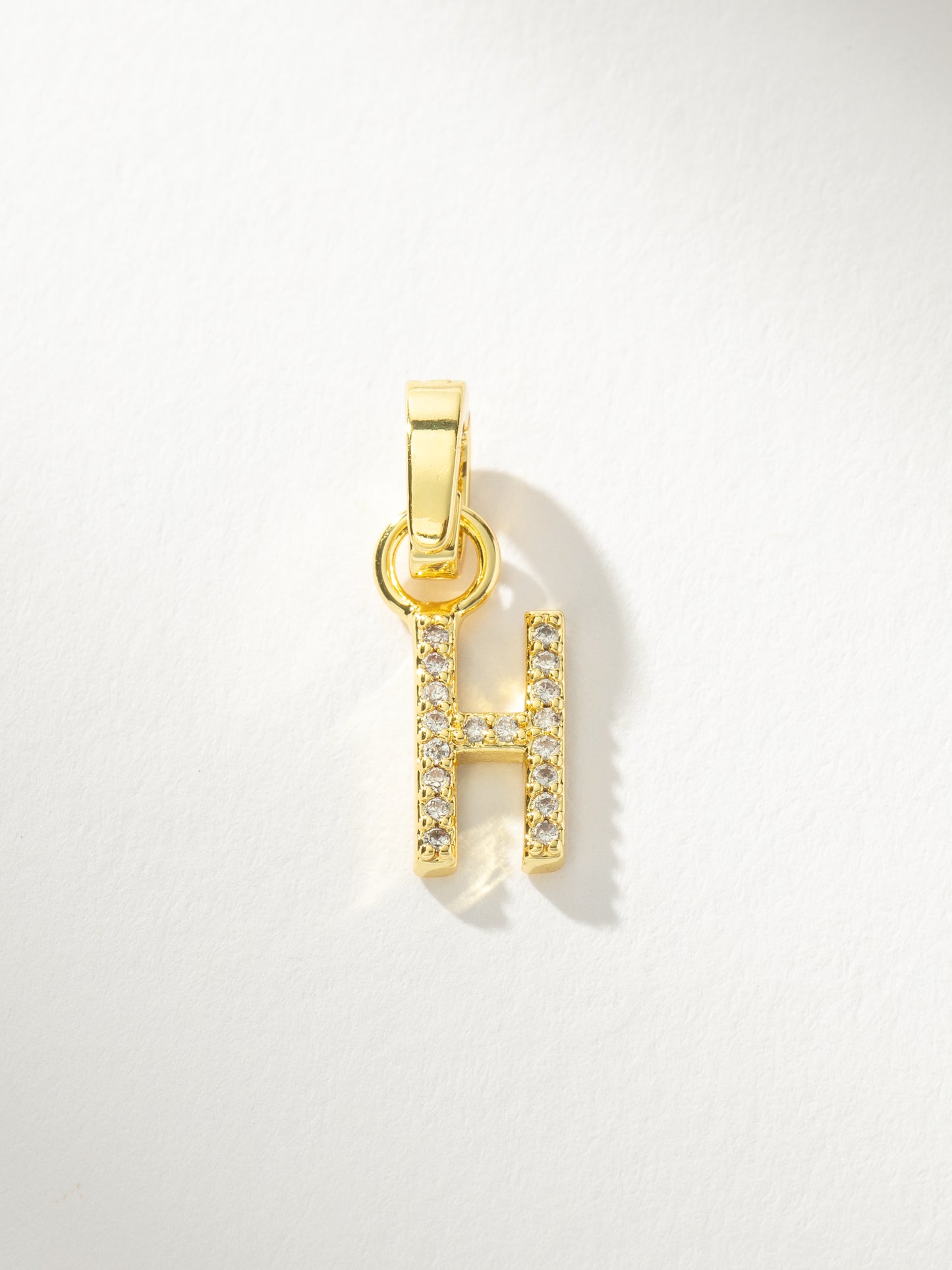 Letter Charm | Gold Clear H | Product Image | Uncommon James