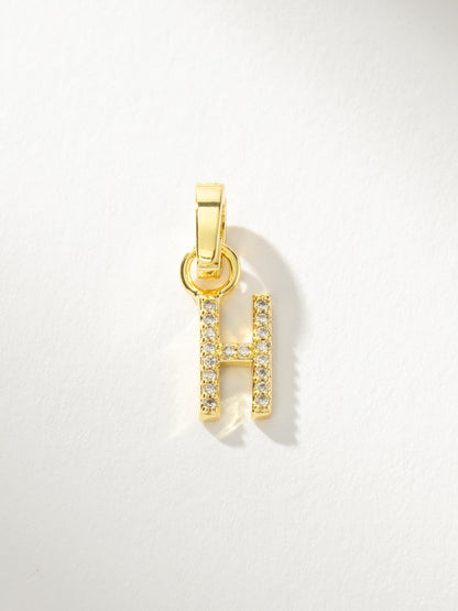 ["Letter Charm ", " Gold Clear H ", " Product Image ", " Uncommon James"]