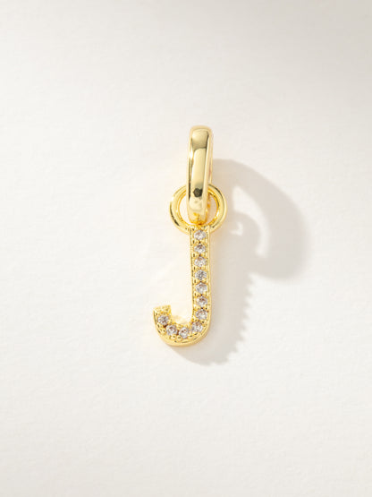 ["Pavé Letter Charm ", " Gold J ", " Product Image ", " Uncommon James"]