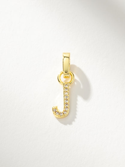 ["Letter Charm ", " Pavé Gold J ", " Product Image ", " Uncommon James"]