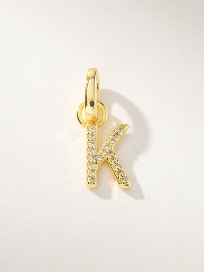 ["Pavé Letter Charm ", " Gold K ", " Product Image ", " Uncommon James"]