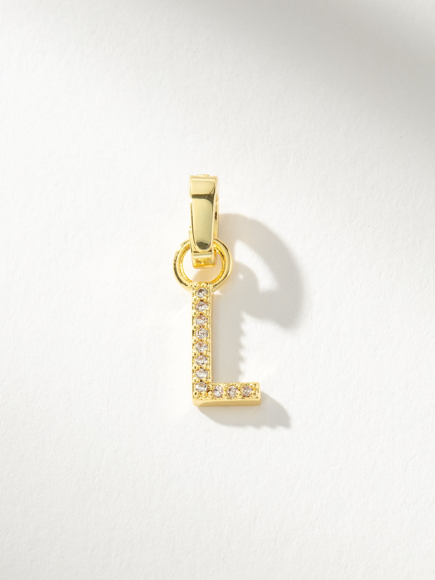 Letter Charm | Gold Clear L | Product Image | Uncommon James