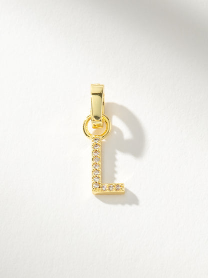 ["Letter Charm ", " Pavé Gold L ", " Product Image ", " Uncommon James"]