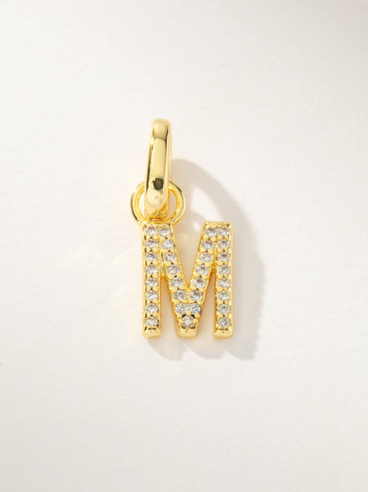 ["Pavé Letter Charm ", " Gold M ", " Product Image ", " Uncommon James"]