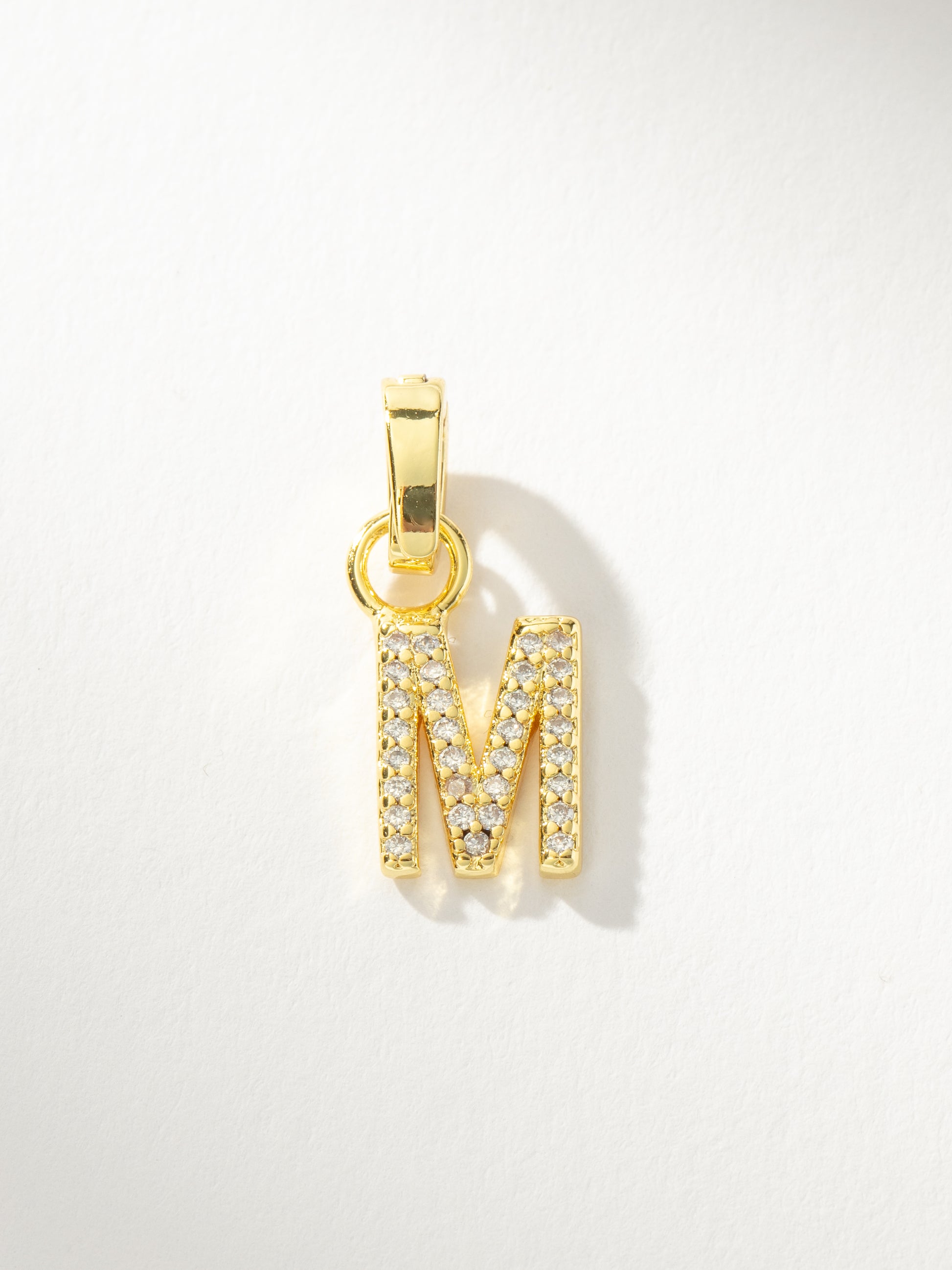 Letter Charm | Gold Clear M | Product Image | Uncommon James