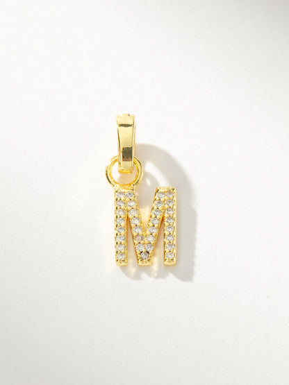["Letter Charm ", " Gold Clear M ", " Product Image ", " Uncommon James"]