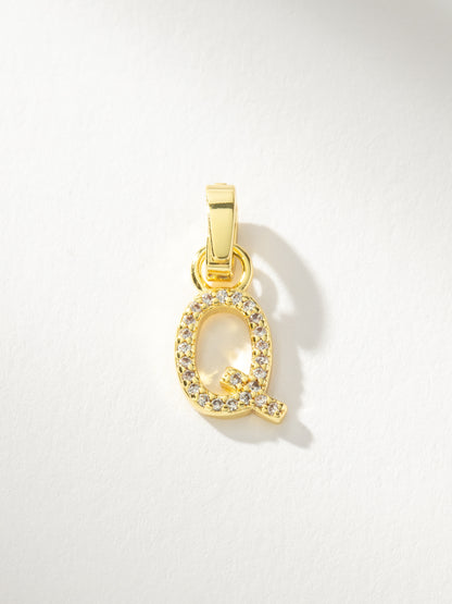 ["Letter Charm ", " Pavé Gold Q ", " Product Image ", " Uncommon James"]