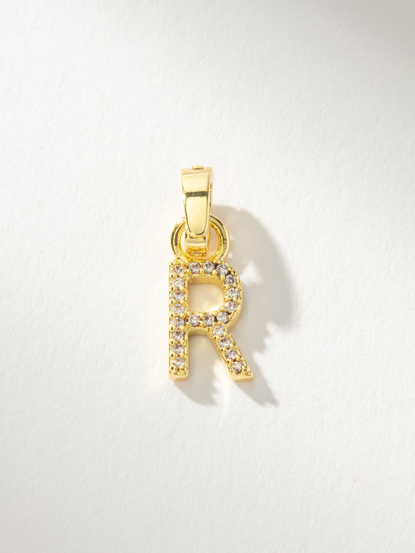 Letter Charm | Gold Clear R | Product Image | Uncommon James