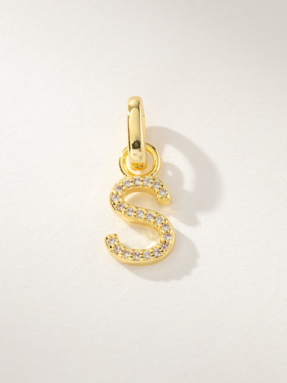 ["Pavé Letter Charm ", " Gold S ", " Product Image ", " Uncommon James"]