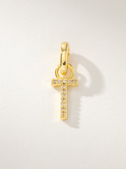 ["Pavé Letter Charm ", " Gold T ", " Product Image ", " Uncommon James"]