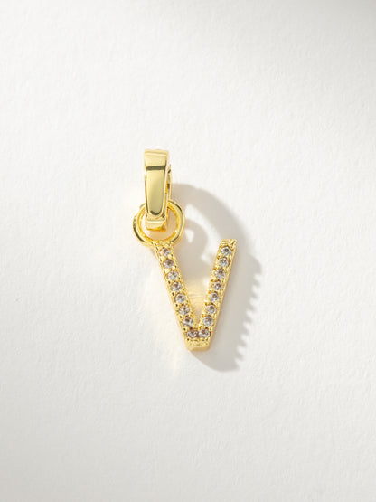 ["Letter Charm ", " Gold Clear V ", " Product Image ", " Uncommon James"]