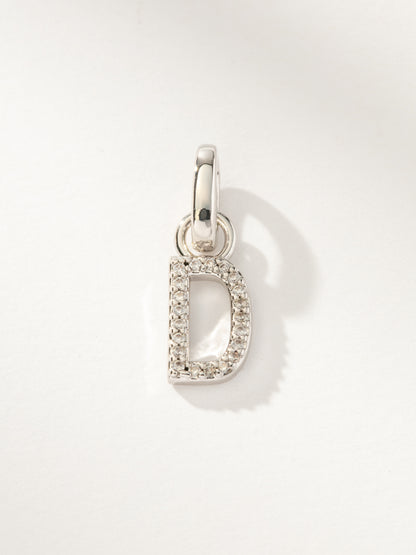 ["Pavé Letter Charm ", " Silver D ", " Product Image ", " Uncommon James"]