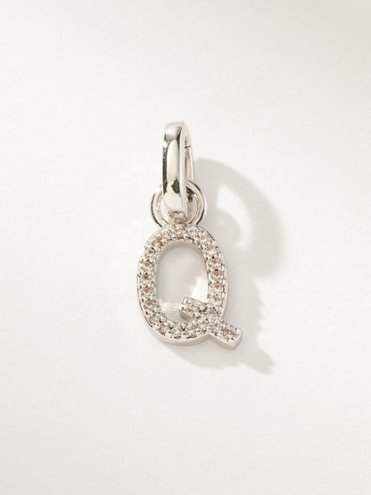 ["Pavé Letter Charm ", " Silver Q ", " Product Image ", " Uncommon James"]