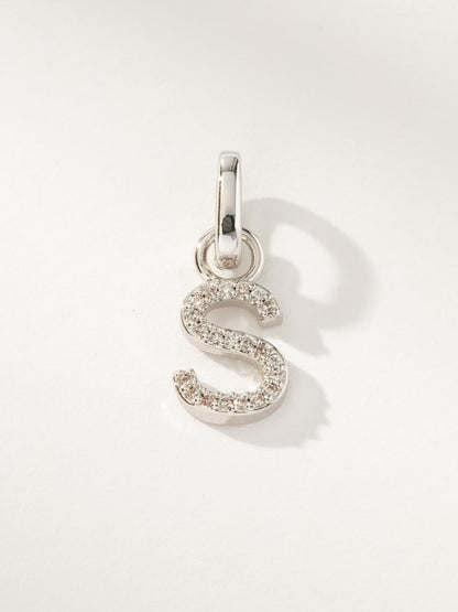 ["Pavé Letter Charm ", " Silver S ", " Product Image ", " Uncommon James"]
