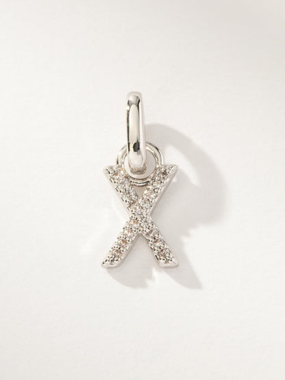 ["Pavé Letter Charm ", " Silver X ", " Product Image ", " Uncommon James"]