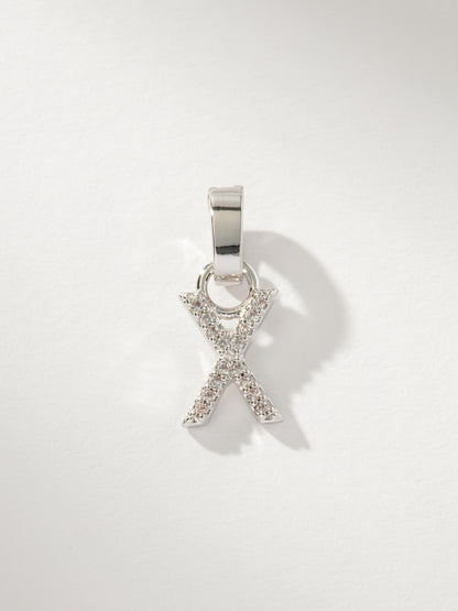 ["Letter Charm ", " Pavé Silver X ", " Product Image ", " Uncommon James"]