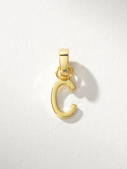 ["Letter Charm ", " Gold Solid C ", " Product Image ", " Uncommon James"]