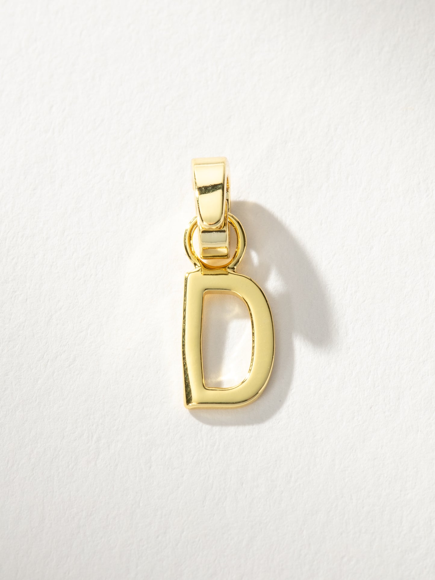 Letter Charm | Gold Solid D | Product Image | Uncommon James