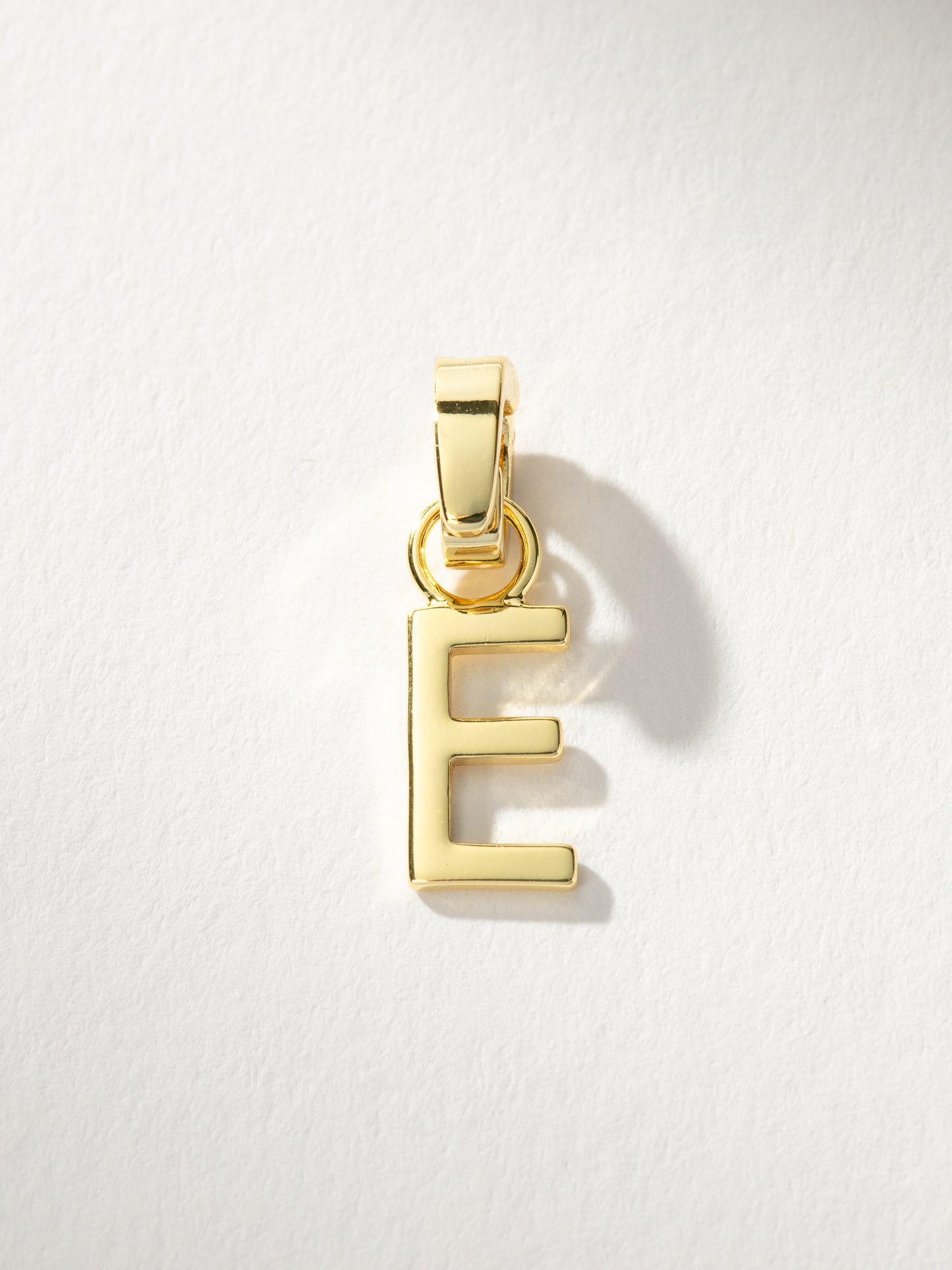 Letter Charm | Gold Solid E | Product Image | Uncommon James