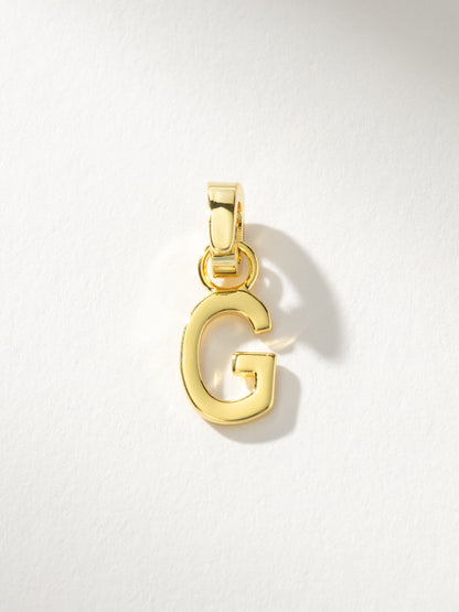 ["Letter Charm ", " Gold Solid G ", " Product Image ", " Uncommon James"]