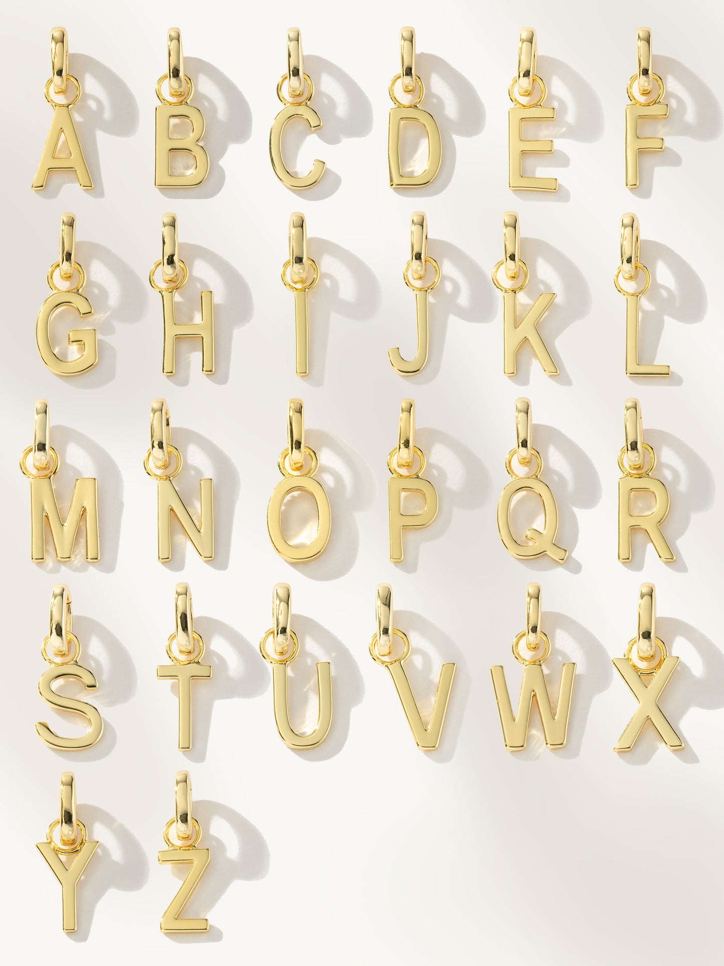Letter Charm | Gold | Group Image | Uncommon James