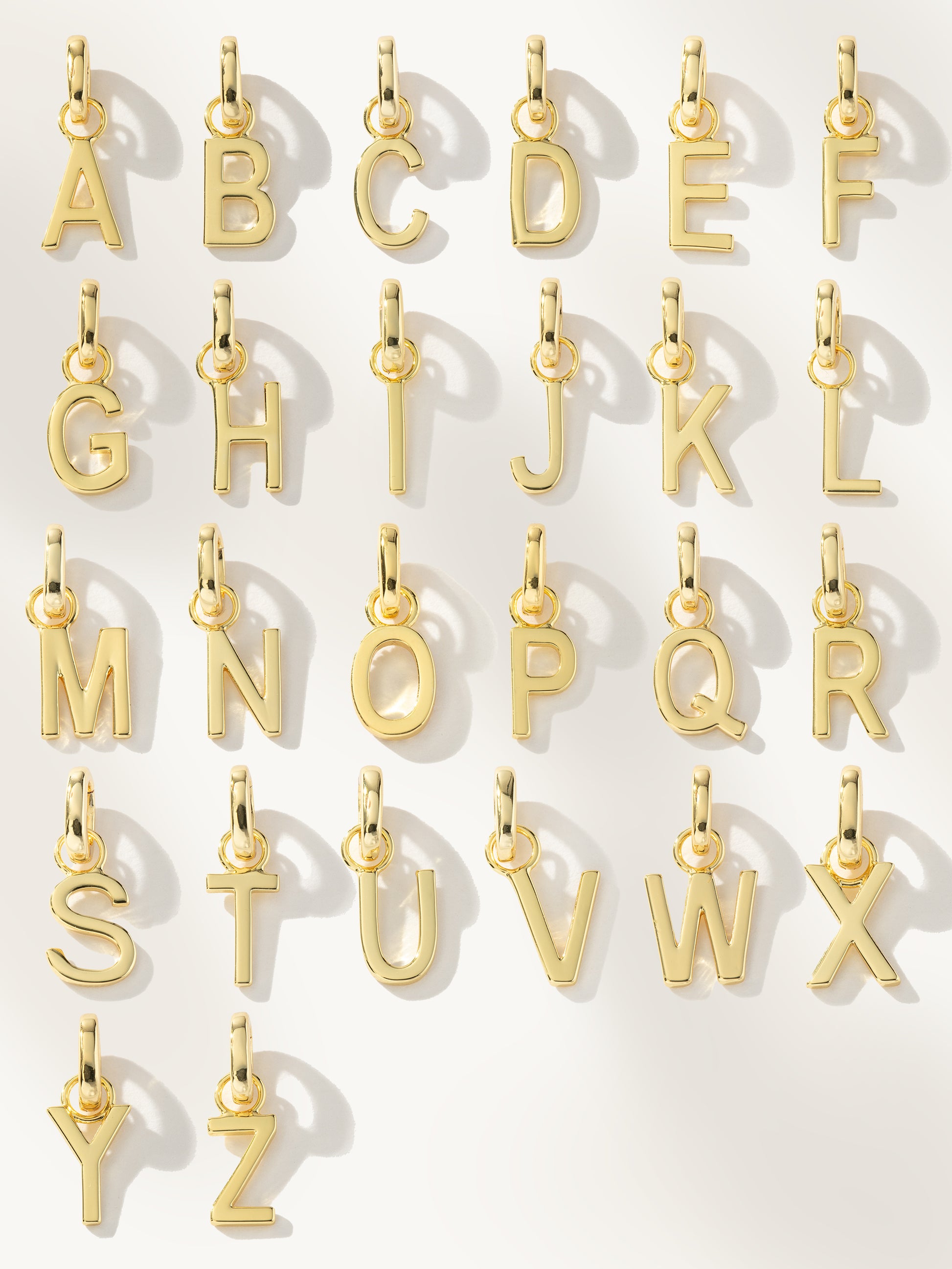 Letter Charm | Gold | Group Image | Uncommon James