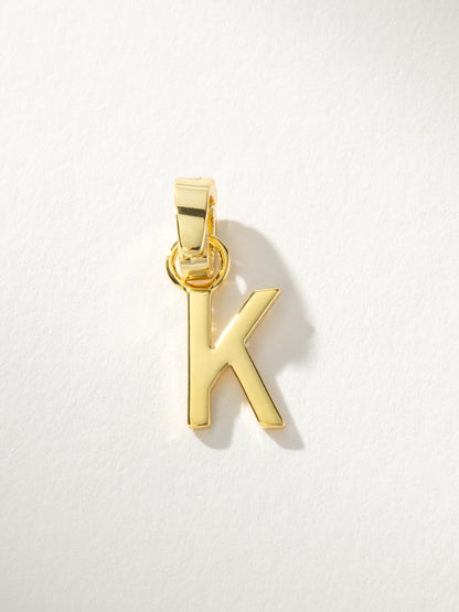 ["Letter Charm ", " Gold Solid K ", " Product Image ", " Uncommon James"]