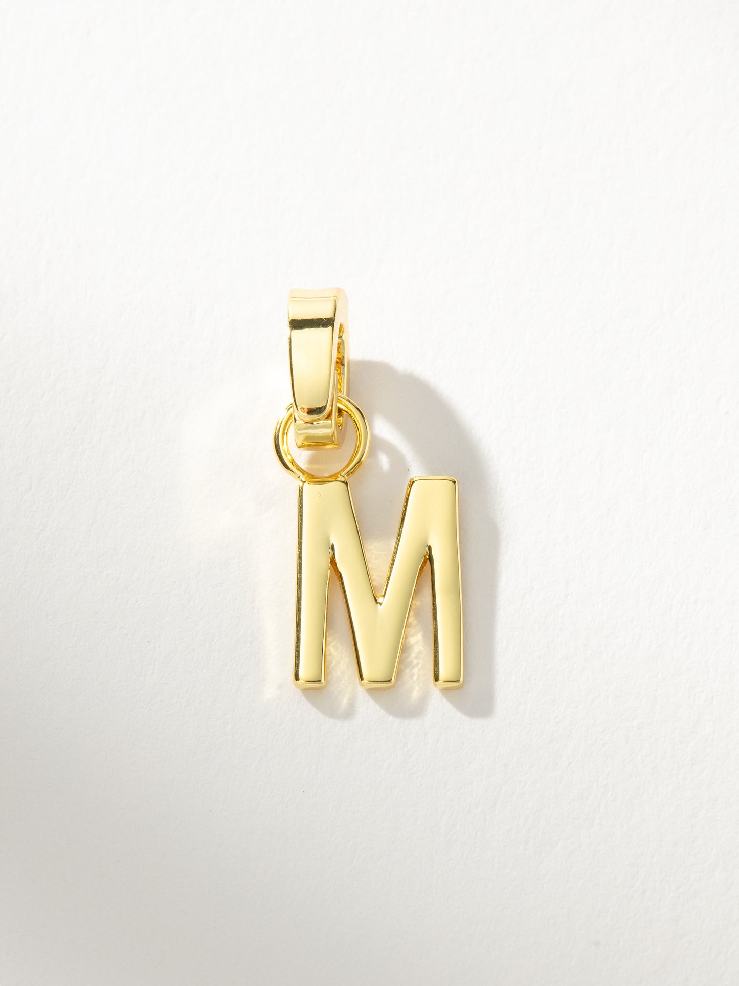 Letter Charm | Gold Solid M | Product Image | Uncommon James