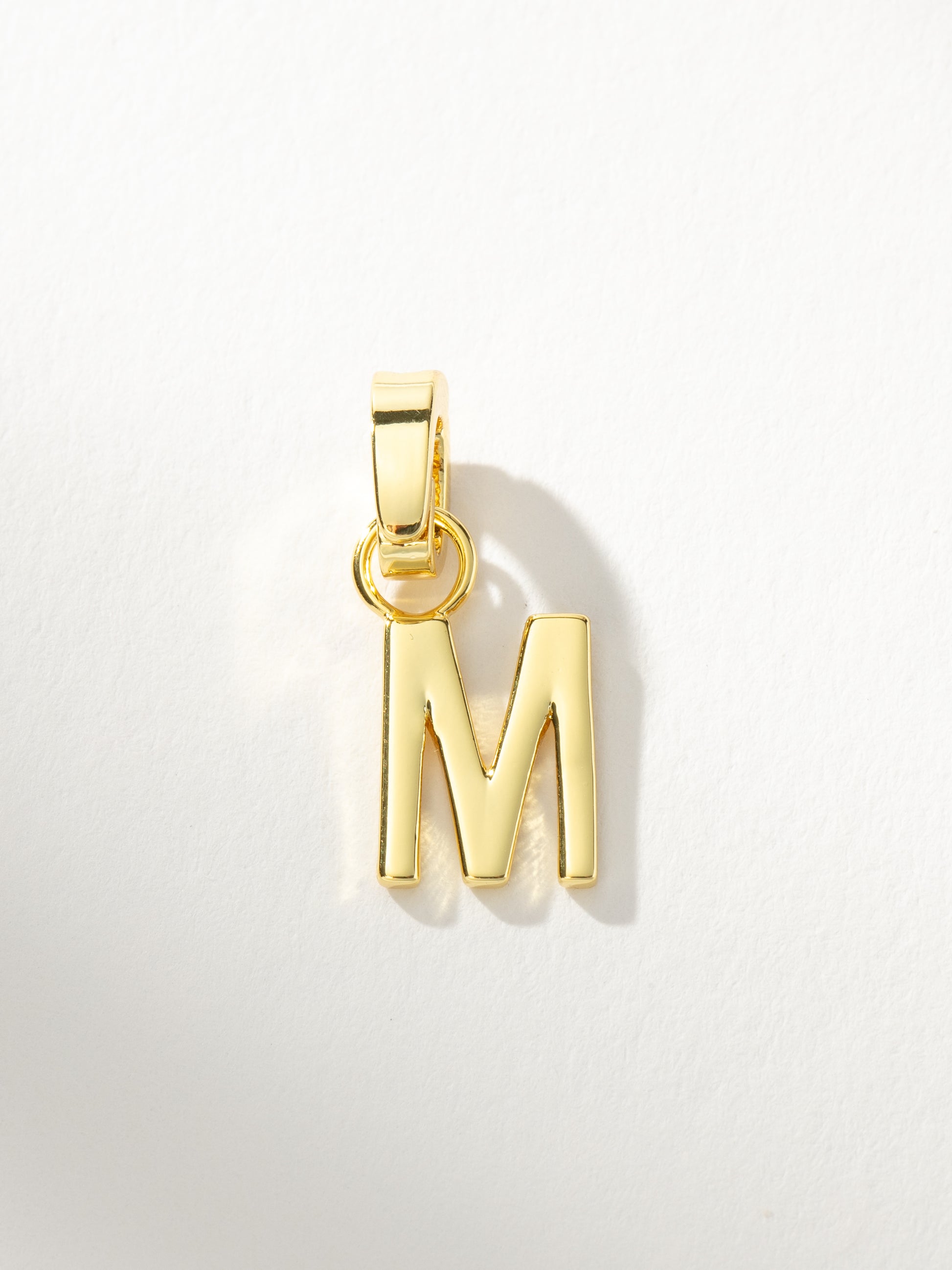 Letter Charm | Gold Solid M | Product Image | Uncommon James