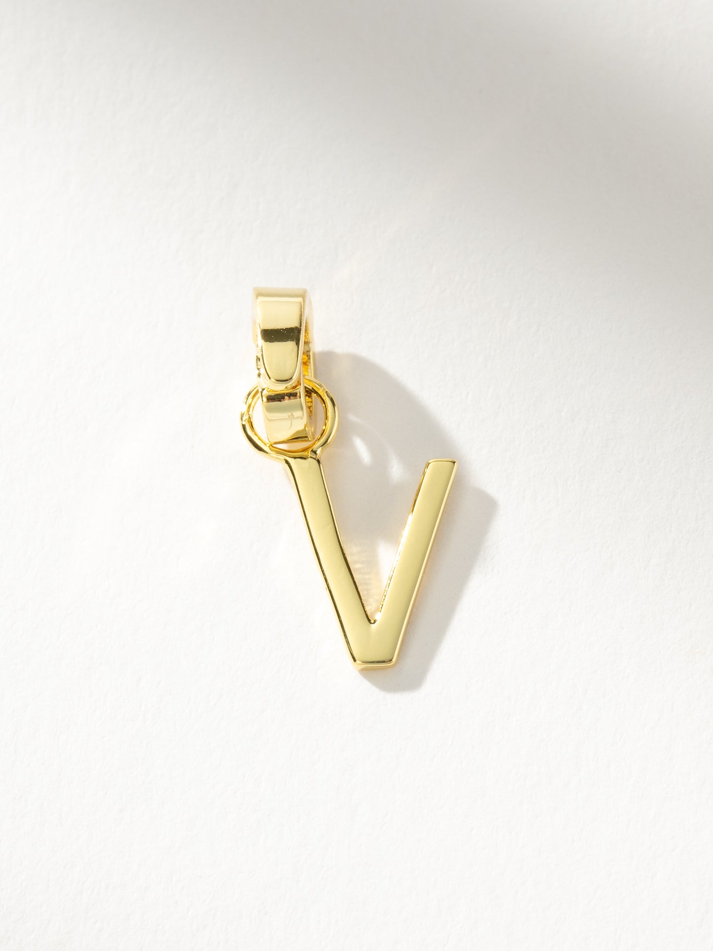 Letter Charm | Gold Solid V | Product Image | Uncommon James