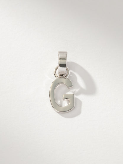 ["Letter Charm ", " Silver Solid G ", " Product Image ", " Uncommon James"]