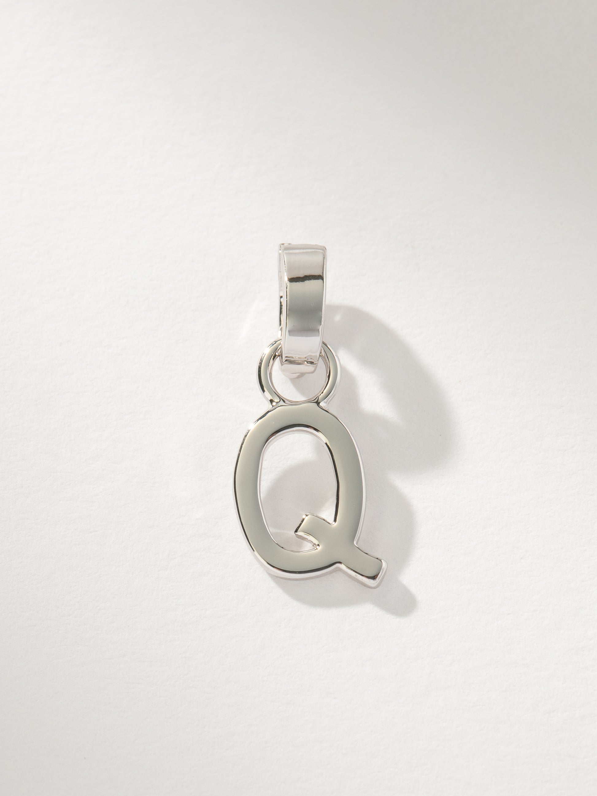 Letter Charm | Silver Solid Q | Product Image | Uncommon James