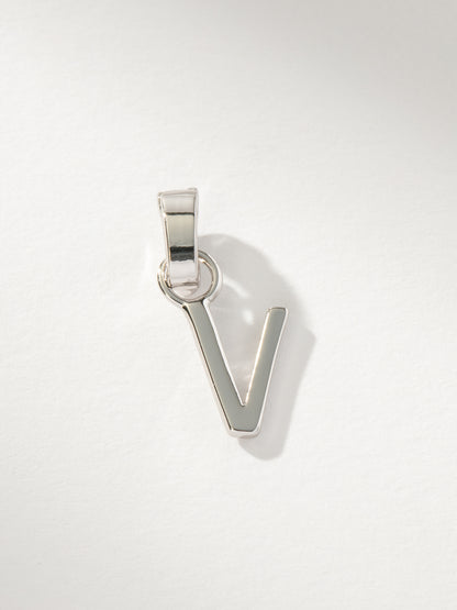 ["Letter Charm ", " Silver Solid V ", " Product Image ", " Uncommon James"]