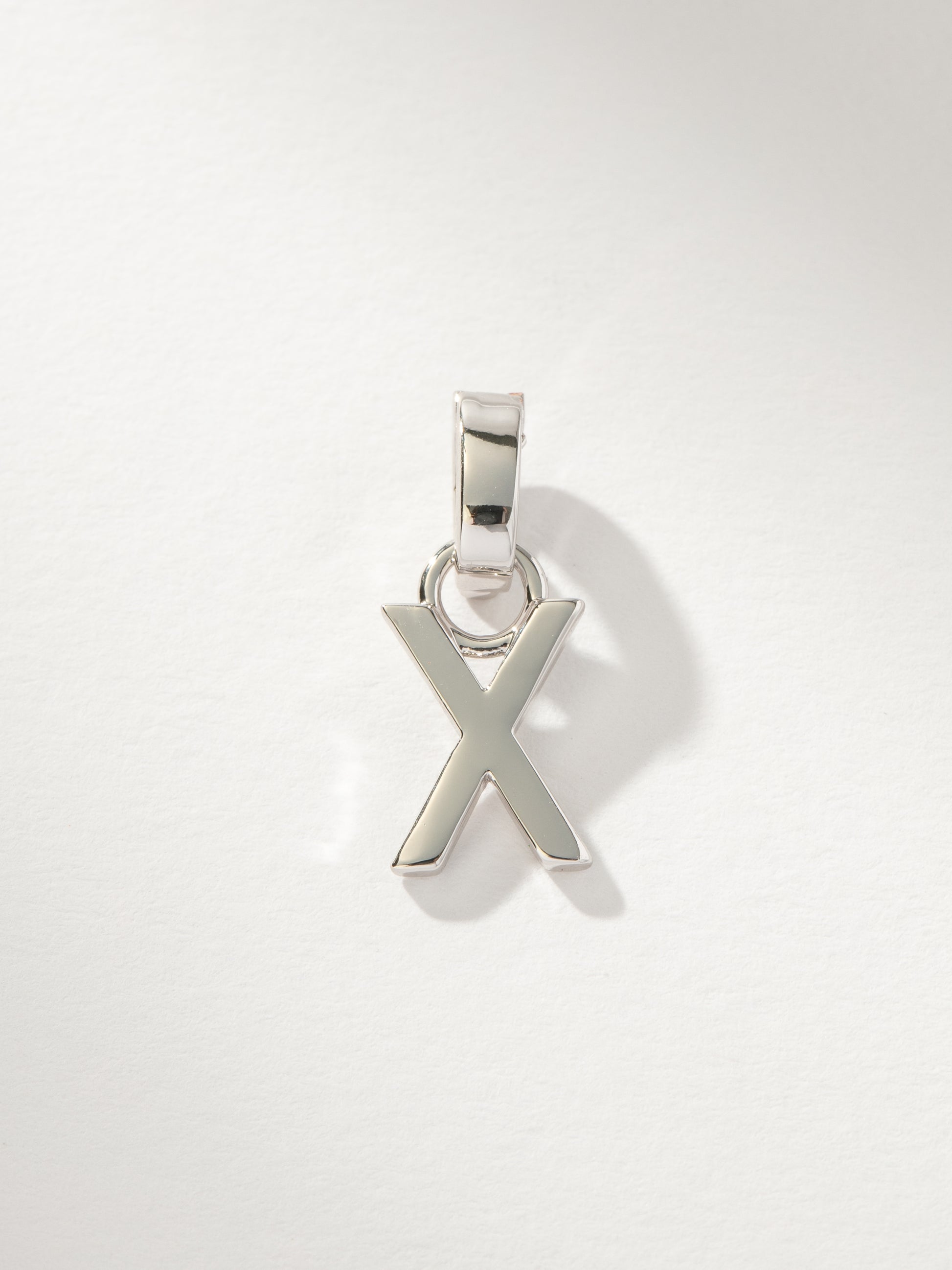 Letter Charm | Silver Solid X | Product Image | Uncommon James