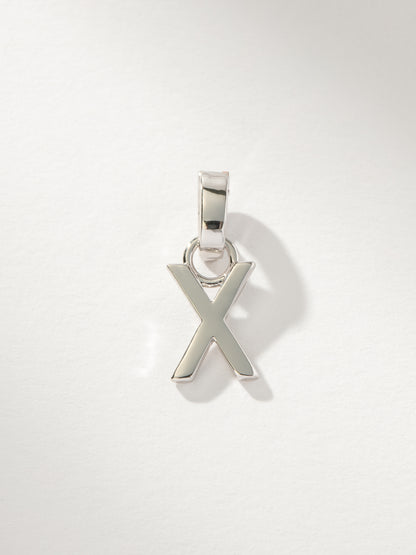 ["Letter Charm ", " Silver Solid X ", " Product Image ", " Uncommon James"]