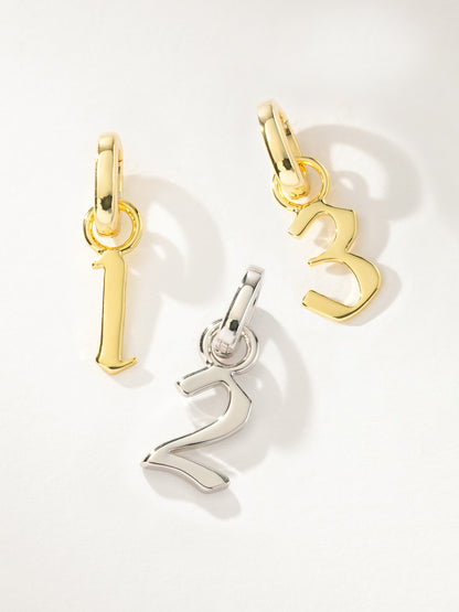 ["Number Charm ", " Gold Silver ", " Group Image ", " Uncommon James"]