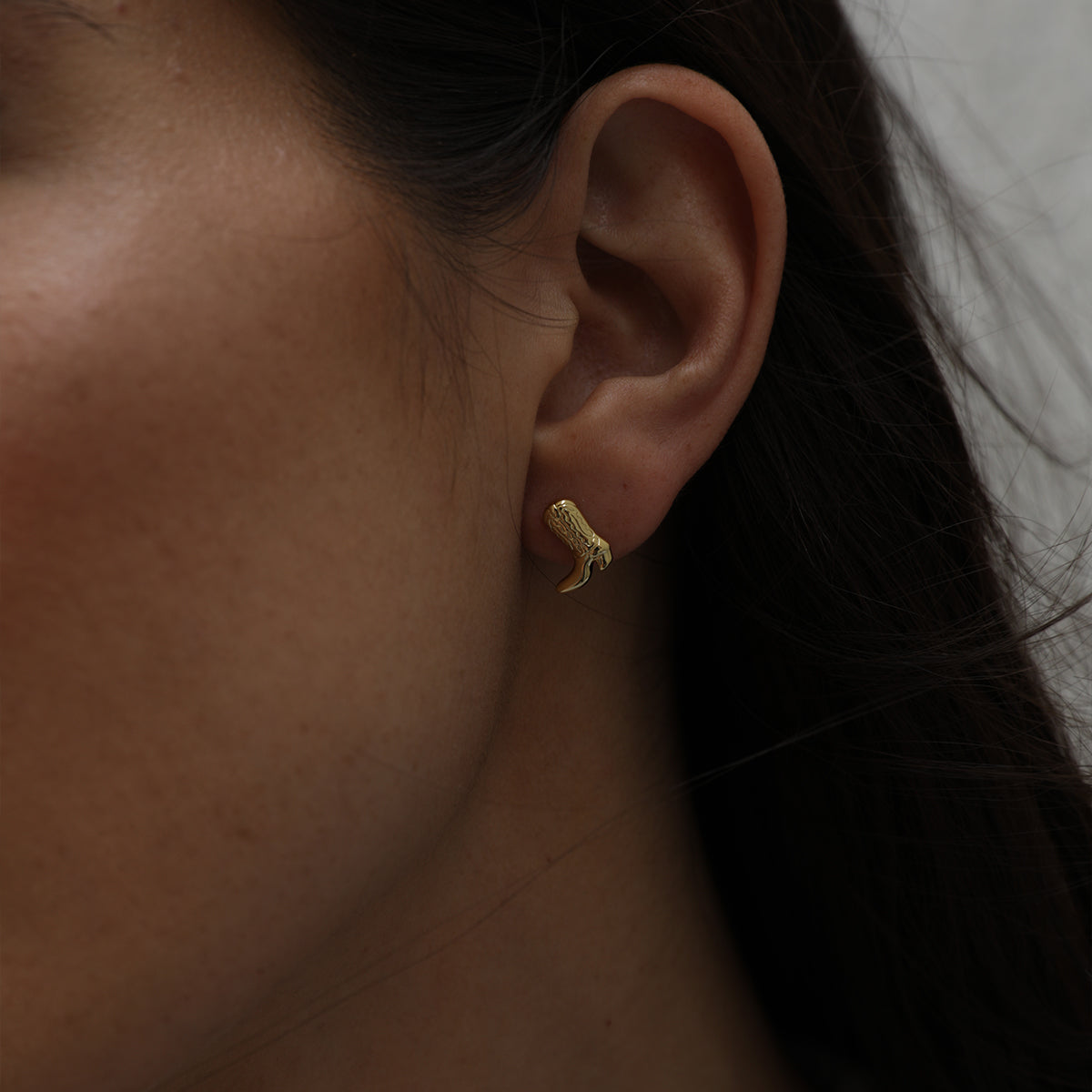 Cowboy Boot Stud Earrings | Gold | Lifestyle Image | Uncommon James